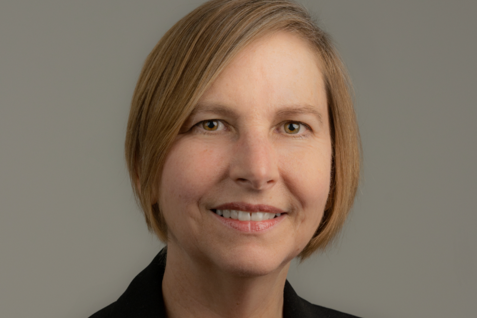 Professional headshot of a woman in business attire used for a press announcement about InfinixBio’s new Chief Marketing Officer.